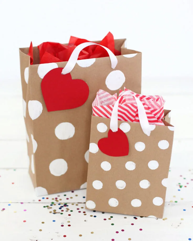 Make your Valentine&rsquo;s gift extra special with a lovely touch! Paint cute polka dots on a simple bag, add a heart-shaped tag, and finish it off with bright red or pink tissue paper. It&rsquo;s the perfect way to wrap up a heartfelt gift for someone you love!