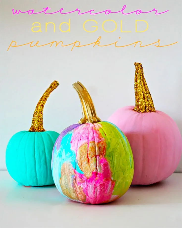 Although we said watercolors are not really used in pumpkin painting ideas, this tutorial definitely defies all odds. Learn how to make these gorgeous watercolor-painted pumpkins with glitter stems.