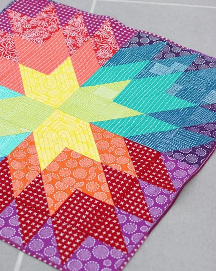 Create this gorgeous and colorful baby quilt pattern for your tiniest tots! &ldquo;When You Wish&rdquo; was designed with simplicity in mind and has a large star quilt block motif in the center of the quilt. Ideal for beginners, this quilt is made with squares and half-square triangles (HST), and the final measurement is 36 &frac12;&rdquo; x 36 &frac12;&rdquo;. You can also quilt it in throw, queen, and king sizes.