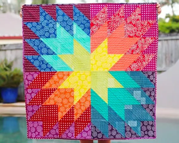 This pattern may look a bit complex but it only features squares and half-square triangles so it's perfect for novices. The bright star motif on this 36.5" x 36.5" baby quilt is bound to make your child's wish come true!