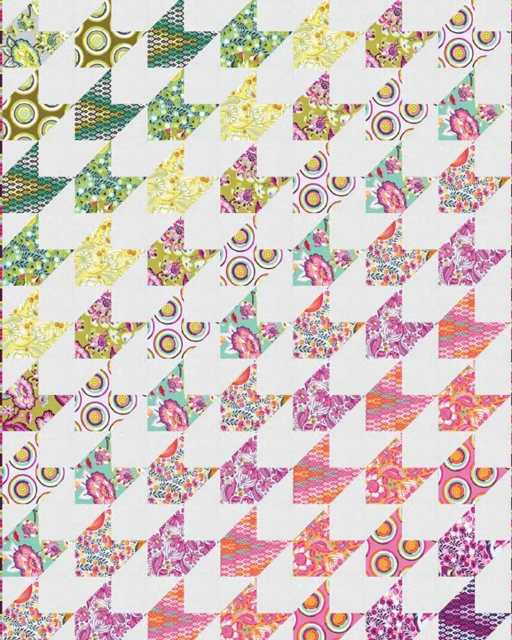 Check out this vibrant and colorful scrap quilt design that is unique and playful! It's the perfect go-to project if you're seeking a pattern that plays with a gradient of colors. So, if you're into color coordination, give this design a shot! It measures precisely 56.5" x 72.5".&nbsp;