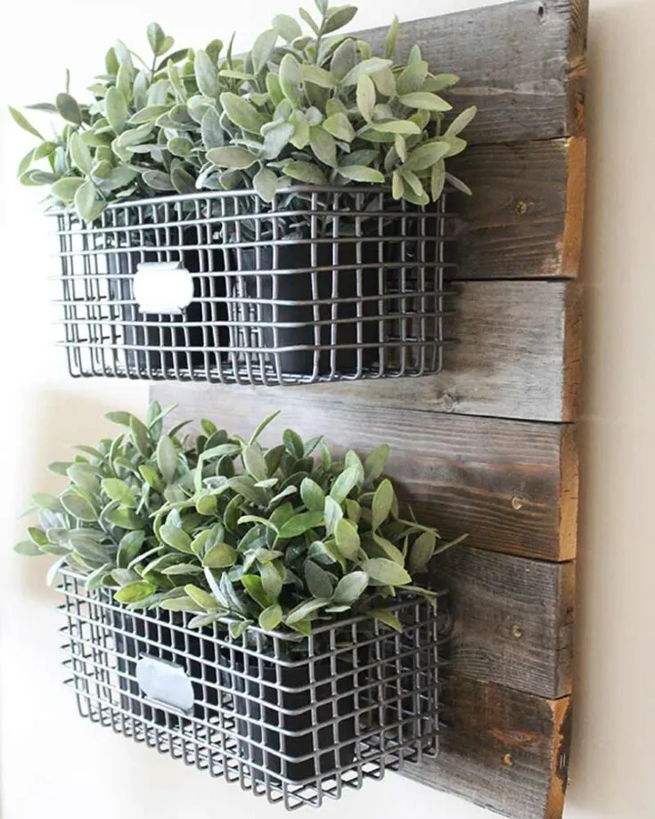 Turn ordinary wire baskets into farmhouse-style hanging decor with this DIY tutorial from Thrifty and Chic. These baskets are perfect for planting homegrown herbs or for organizing small items. With just a few simple steps, you can add a touch of rustic charm to your space