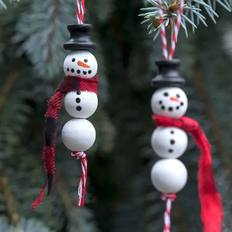 Create one, two, or three snowmen that dangle graciously from your tree. Being made out of wood they are even studied and able to be kept for the next Christmas season. Learn to make it in the tutorial below!