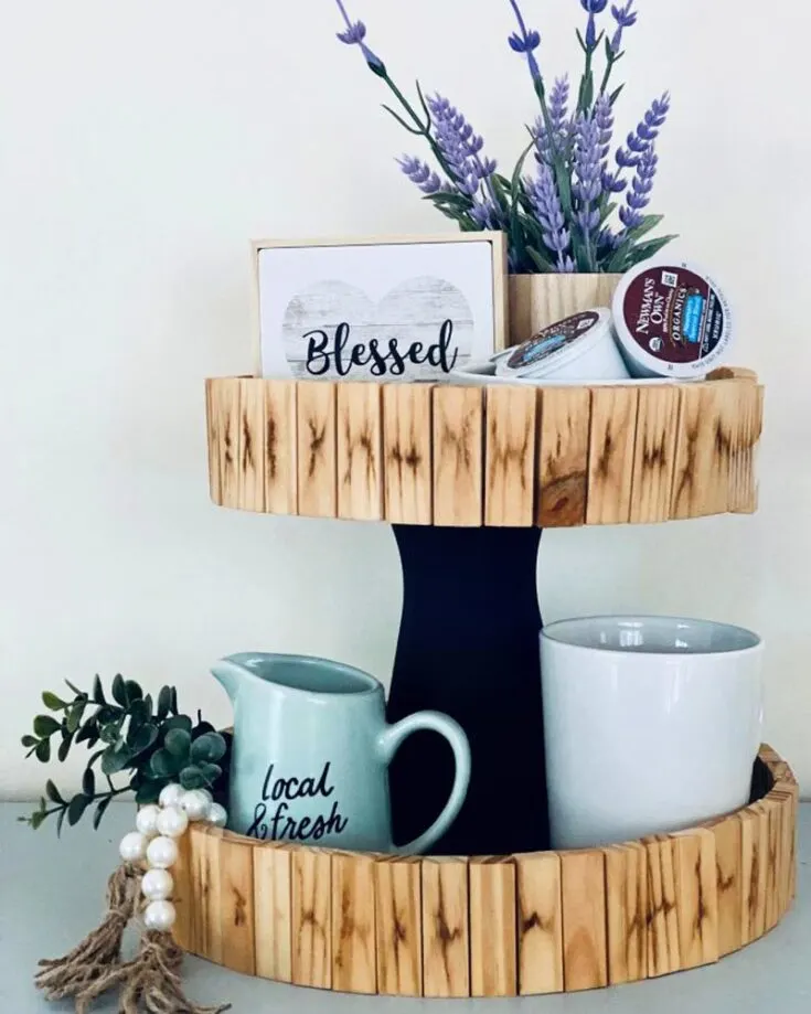 Display treats, candles, and seasonal accents with this farmhouse style wood tiered tray on your kitchen countertop. This craft is a little out of the box as it is incorporated with Jenga blocks! Can you believe it? You can opt for staining the blocks with coffee for a rustic look.
