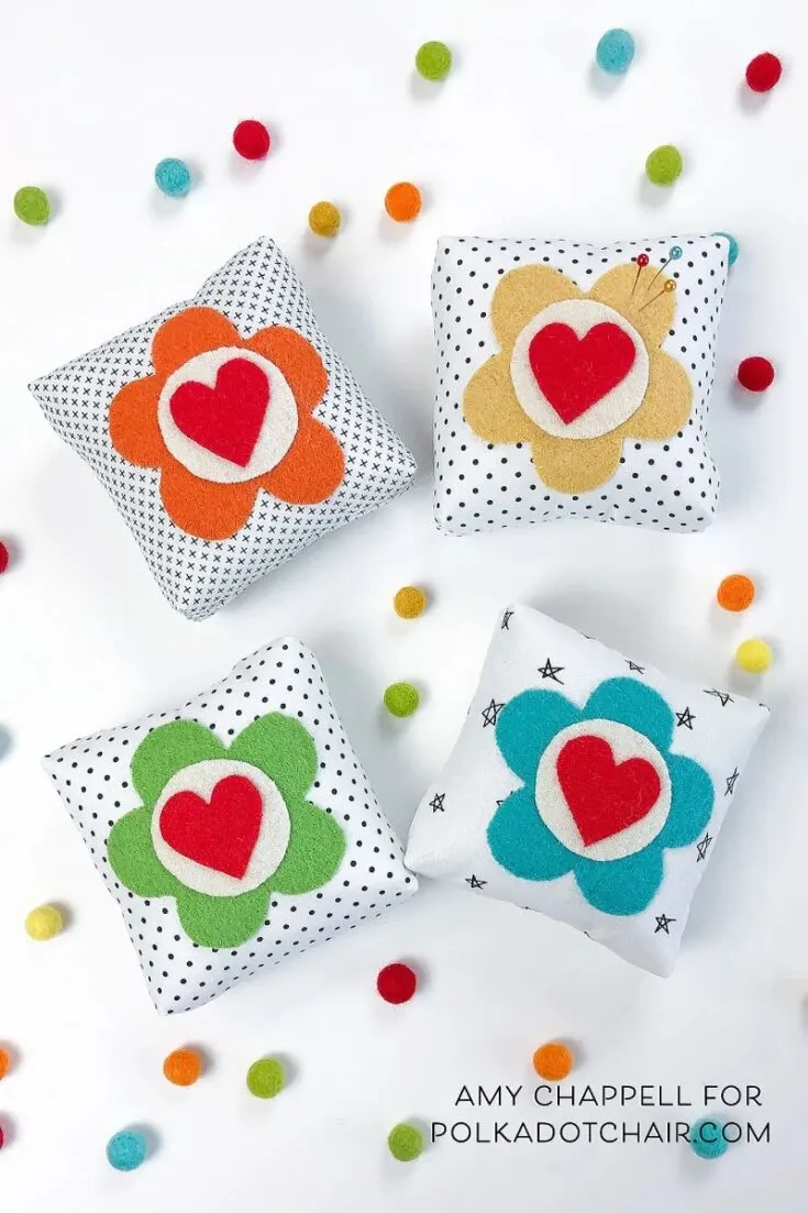 Learn how to make a cushion decorated with a wool applique in this easy-to-follow tutorial. This design features a flower and heart, but you can customize the design to your heart's desire. Using a wool applique technique on a cushion is perfect if you're looking for a canvas for some practice.