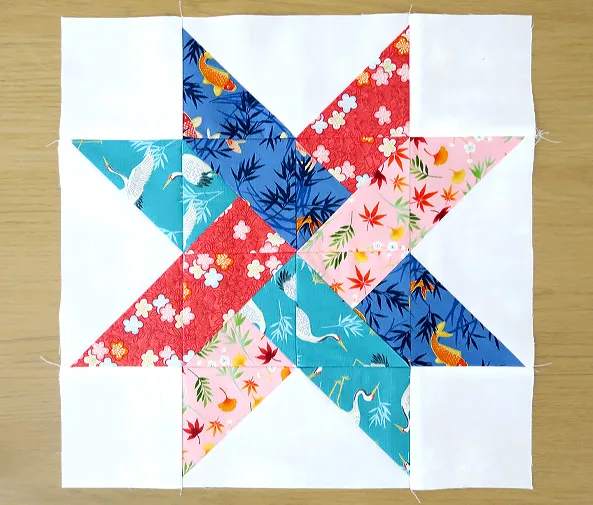 This is a wonderful star block that produces a distinctive weave-in effect in the middle. You'll be required to make a few HSTs, SQSTs, and Flying Geese units for this tutorial.
