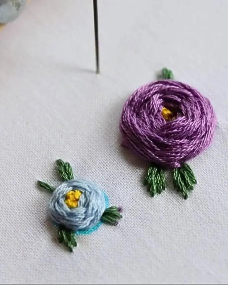 If you&rsquo;re looking to experiment with different embroidering styles, this design is calling your name. Try out this pattern that only requires two types of stitches: the obvious woven wheel stitch and the fishbone stitch.